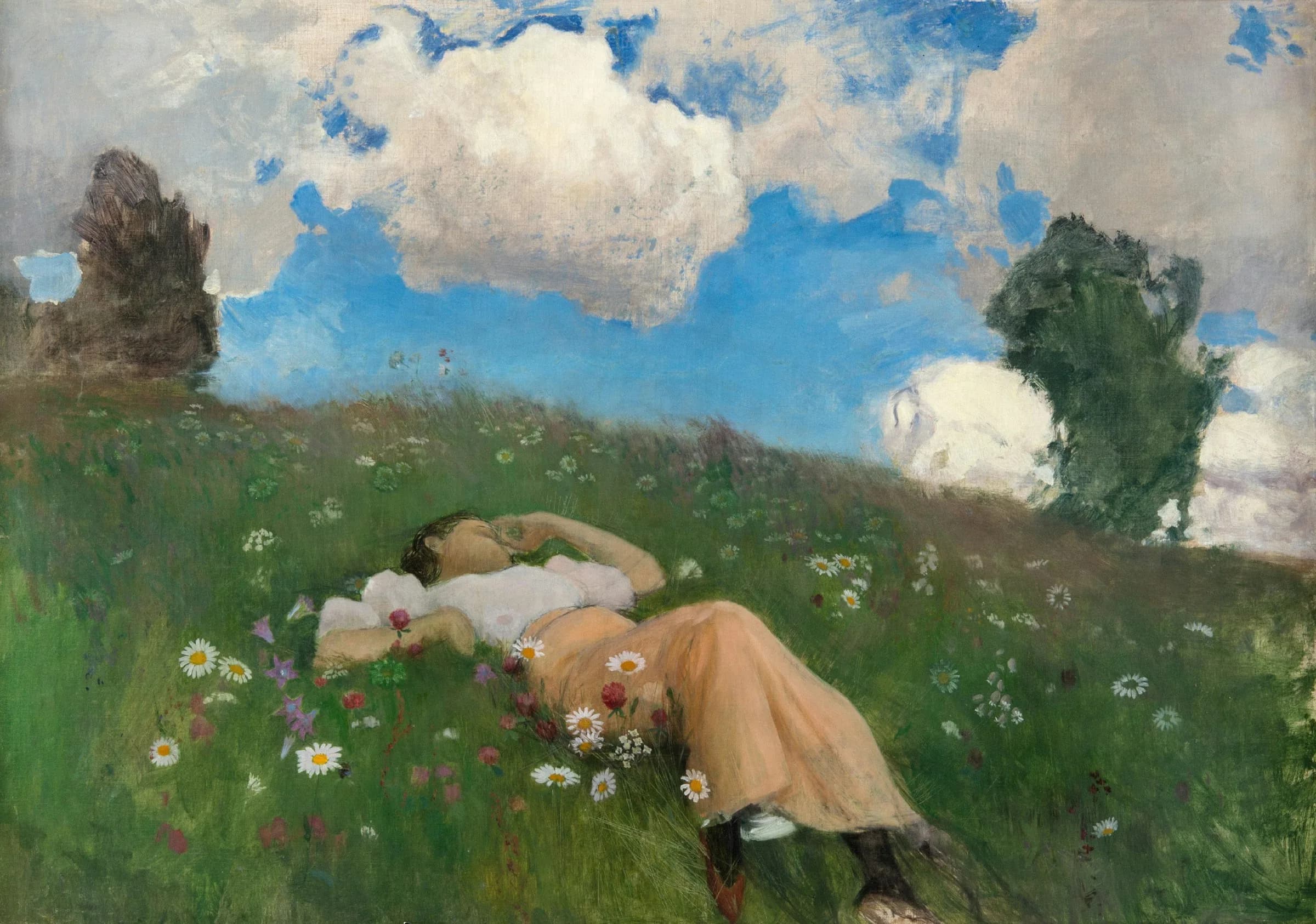 Girl lying lazily on grass field